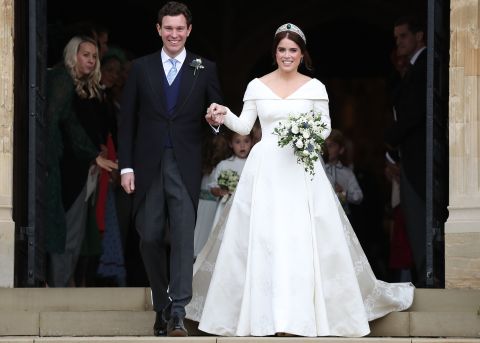 Britain's Princess Eugenie of York and her husband Jack Brooksbank emerge from St. George's Chapel, Windsor Castle on Friday, October 12 after their wedding ceremony.