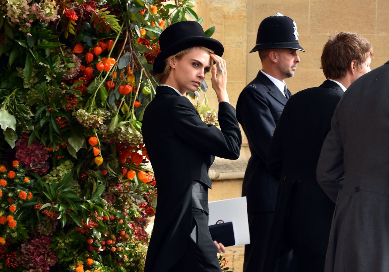 British model Cara Delevingne leaves after the ceremony.