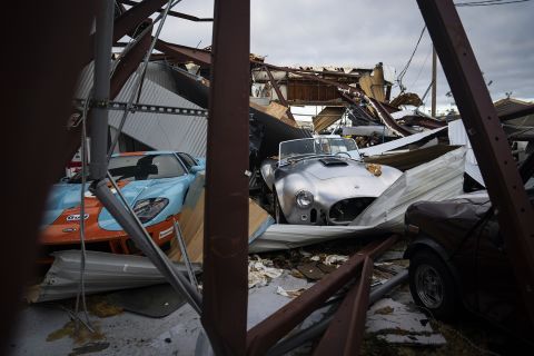 Collector cars are covered in debris in Panama City on October 11.