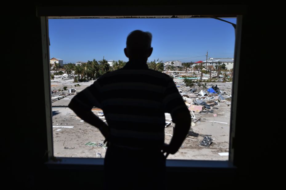 Dough Shelby looks out at the destruction from his house in Mexico Beach on October 12.