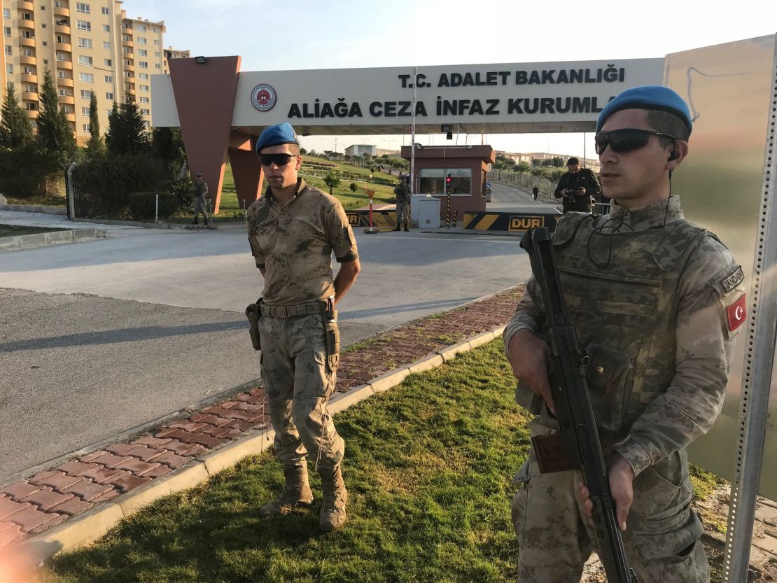 Turkish security officers outside the courthouse in Aliaga, Turkey, on Friday. 