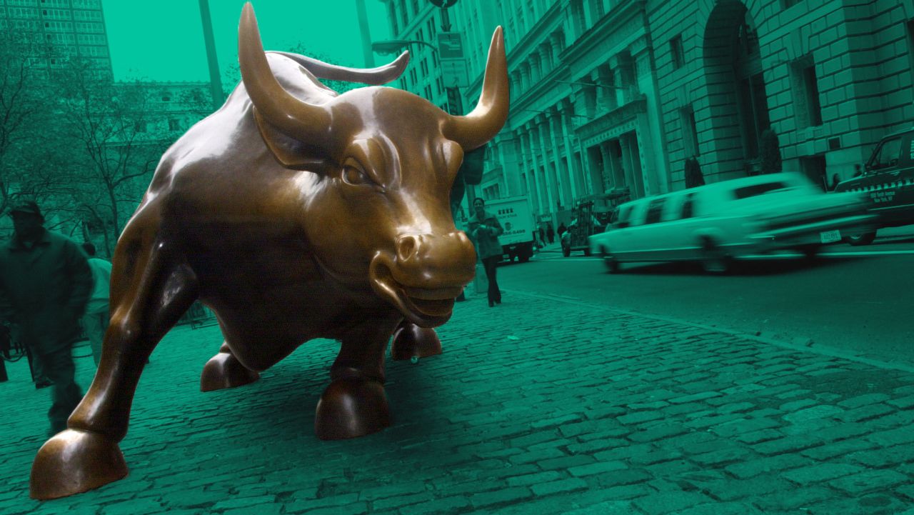 382055 03: A bronze sculpture of a bull is displayed on Broadway in the financial district November 14, 2000 in New York City. The sculpture began as a practical joke by Italian sculptor Arturo di Modica, who originally placed it in front of the New York Stock Exchange building in the middle of the night. The NYSE promptly removed the bull and eventually placed it on Broadway. (Photo by Chris Hondros/Newsmakers)