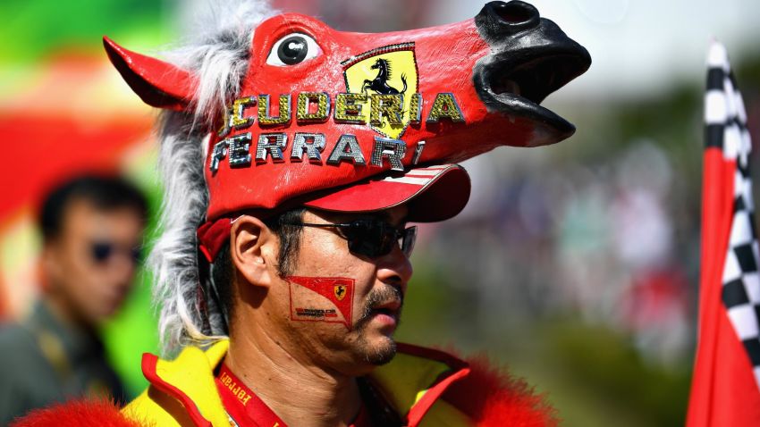 SUZUKA, JAPAN - OCTOBER 07: A Ferrari fan enjoys the atmosphere around the circuit before the Formula One Grand Prix of Japan at Suzuka Circuit on October 7, 2018 in Suzuka.  (Photo by Clive Mason/Getty Images)
