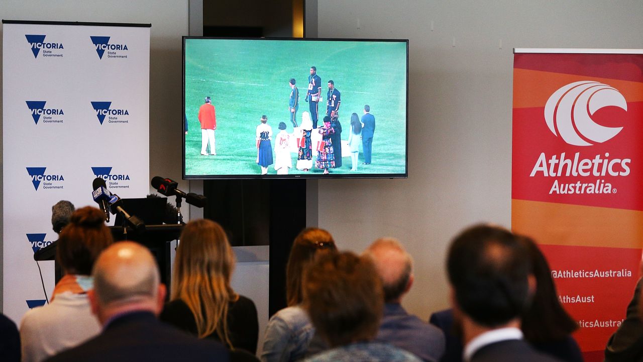 Journalists attend the announcement of a bronze statue to be built in honor of Peter Norman in Melbourne. Australians will celebrate October 9 as "Peter Norman Day."