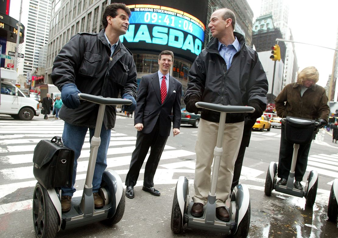 Segway inventor Dean Kamen takes a ride with Jeff Bezos in New York City in 2002.