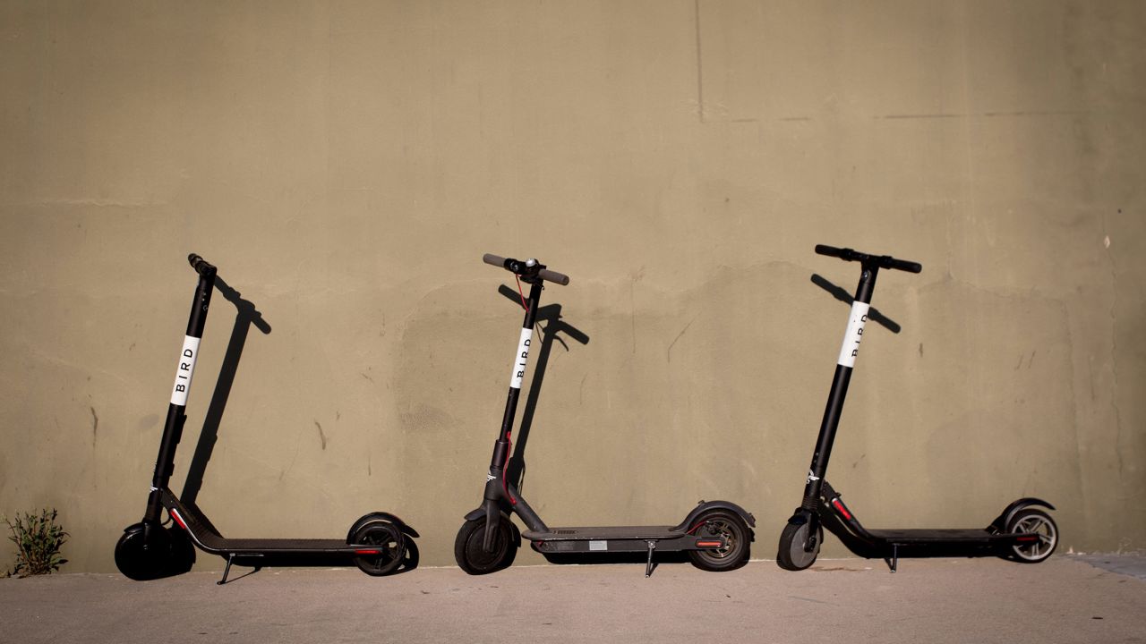 Bird scooters rest on a sidewalk in San Diego. (Frank Duenzl/picture-alliance/dpa/AP Images)