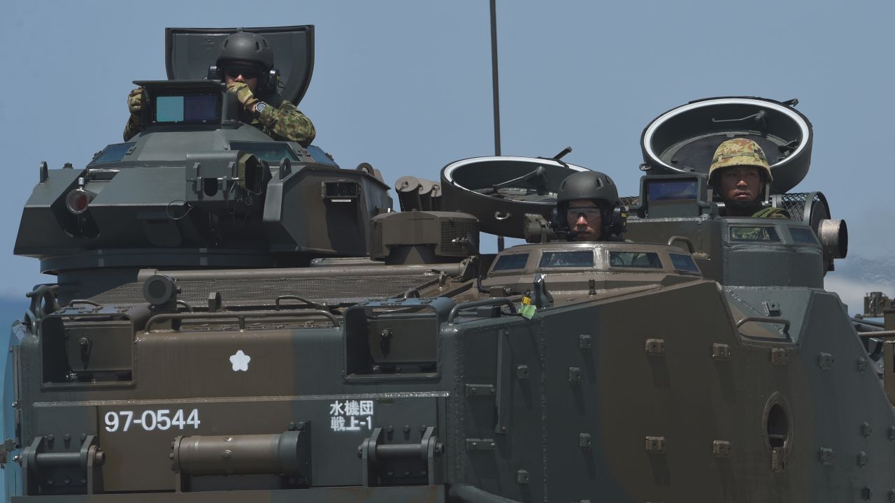 Japanese Ground Self Forces' hit the beach during an amphibious landing exercise at the beach of the Philippine navy training center on the South China Sea in 2018.