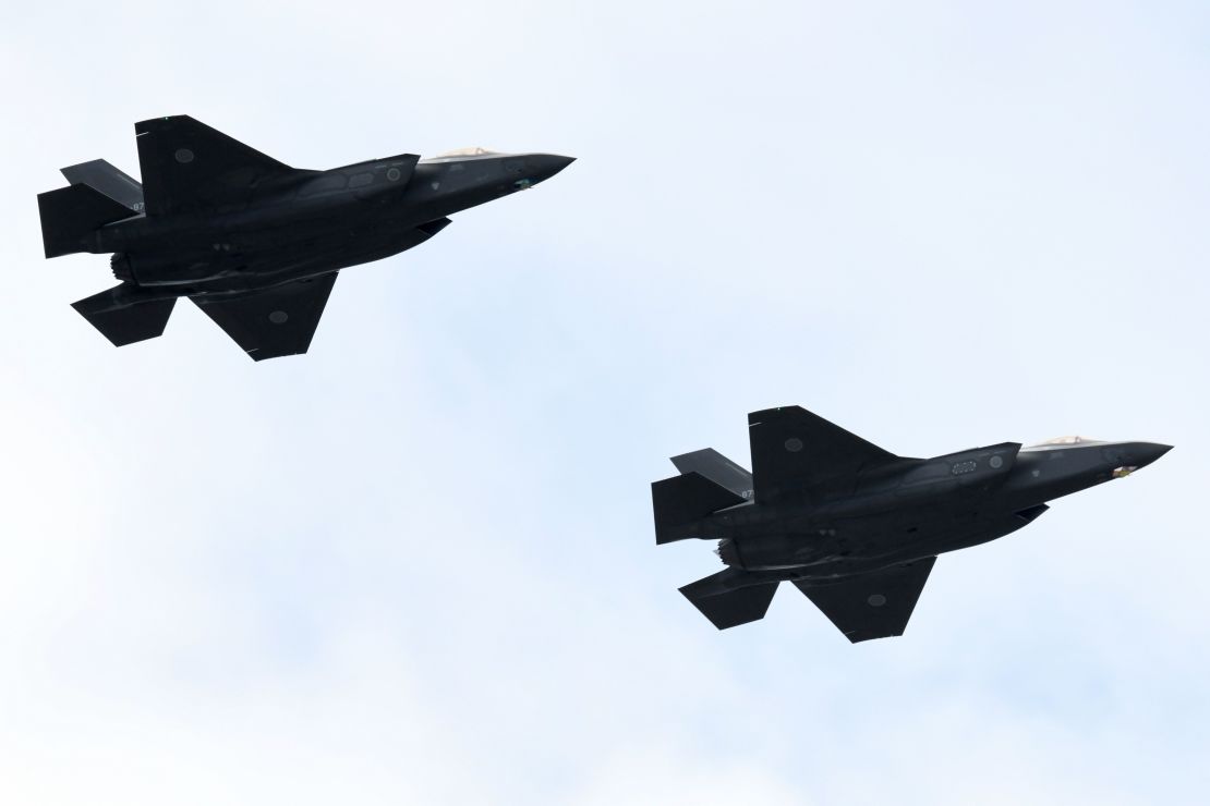 F-35 fighter aircraft from the Japan Air Self-Defense Force take part in a military review at the Ground Self-Defence Force's Asaka training ground in Asaka, Saitama prefecture on October 14, 2018.