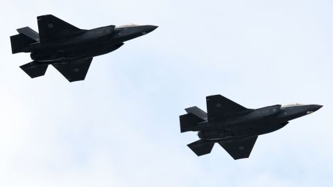 F-35 fighter aircraft from the Japan Air Self-Defense Force take part in a military review at the Ground Self-Defence Force's Asaka training ground in Asaka, Saitama prefecture on October 14, 2018.