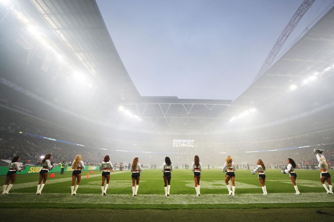The Oakland Raiders cheerleaders -- "The Raiderettes" -- look on ahead of the game against the Seattle Seahawks.