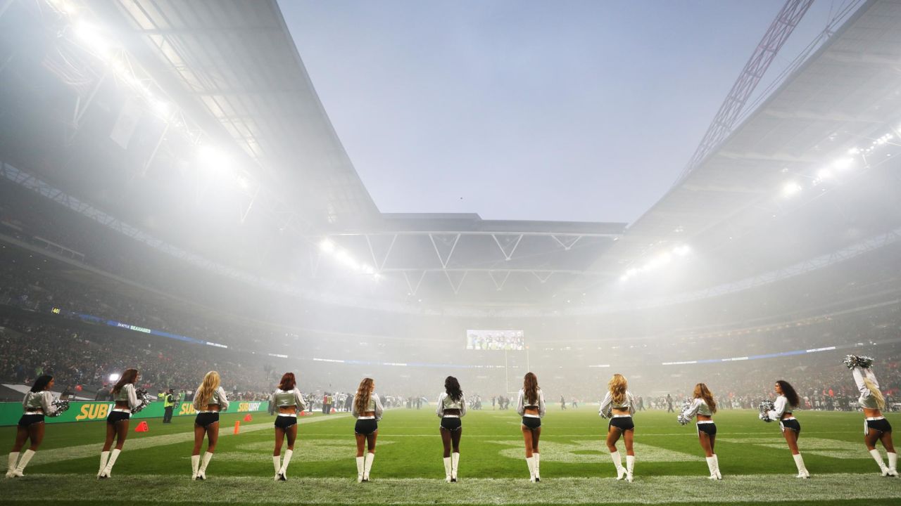 LONDON, ENGLAND - OCTOBER 14:   The Oakland Raiders Cheerleaders ' the Raiderettes' look on ahead of the NFL International series match between Seattle Seahawks and Oakland Raiders at Wembley Stadium on October 14, 2018 in London, England.  (Photo by Naomi Baker/Getty Images)