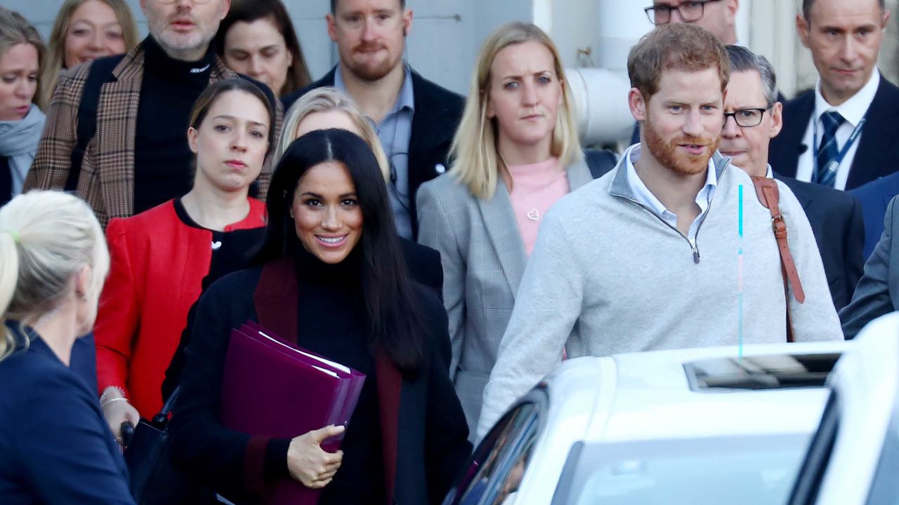 Prince Harry and wife Meghan pictured arriving into Sydney on Monday. 