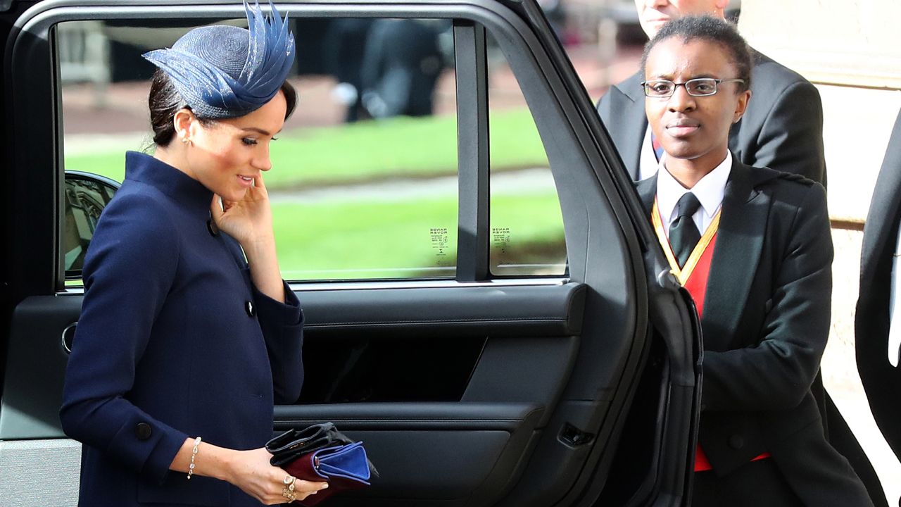 Britain's Meghan, Duchess of Sussex arrive to attend the wedding of Britain's Princess Eugenie of York to Jack Brooksbank at St George's Chapel, Windsor Castle, in Windsor, on October 12, 2018. (Photo by Gareth Fuller / POOL / AFP)        (Photo credit should read GARETH FULLER/AFP/Getty Images)