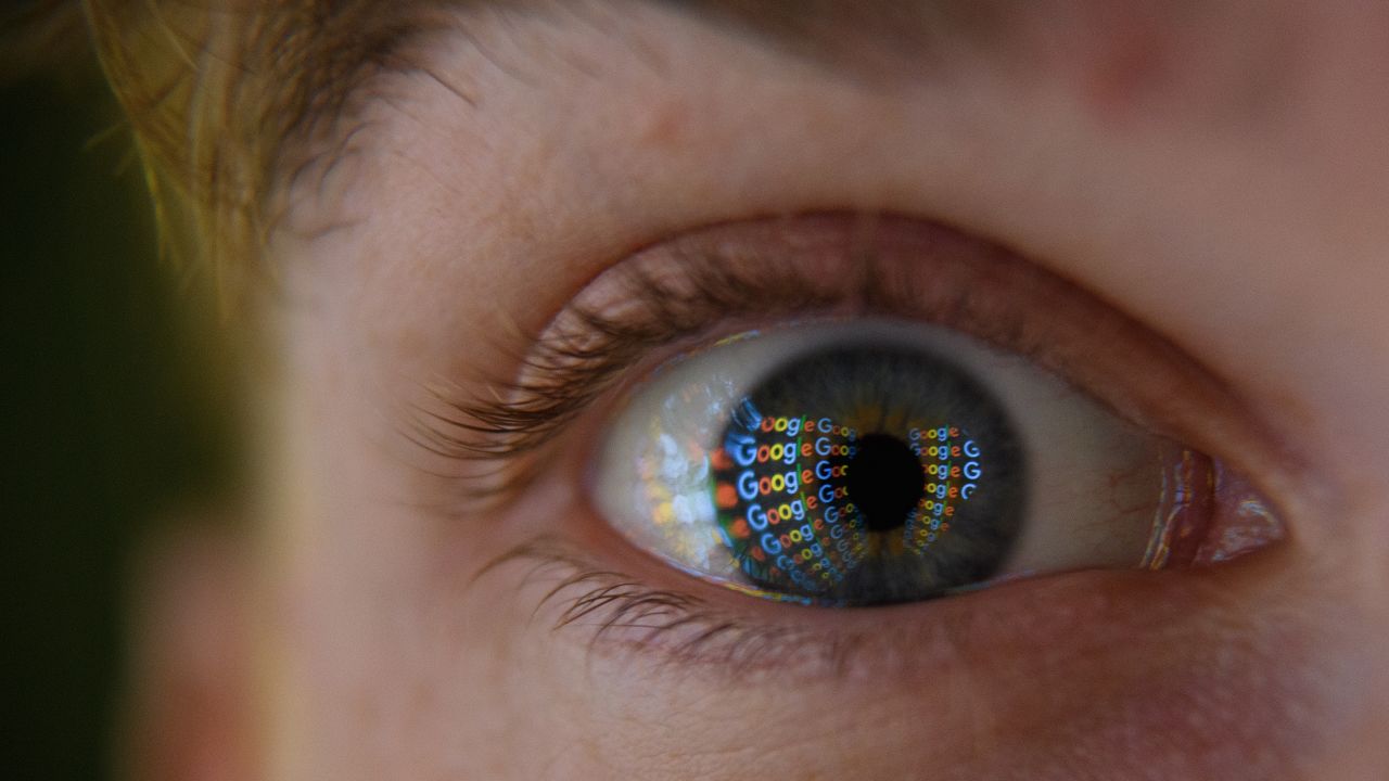 LONDON, ENGLAND - AUGUST 09: In this photo illustration, an image of the Google logo is reflected on the eye of a young man on August 09, 2017 in London, England. Founded in 1995 by Sergey Brin and Larry Page, Google now makes hundreds of products used by billions of people across the globe, from YouTube and Android to Smartbox and Google Search. (Photo by Leon Neal/Getty Images)
