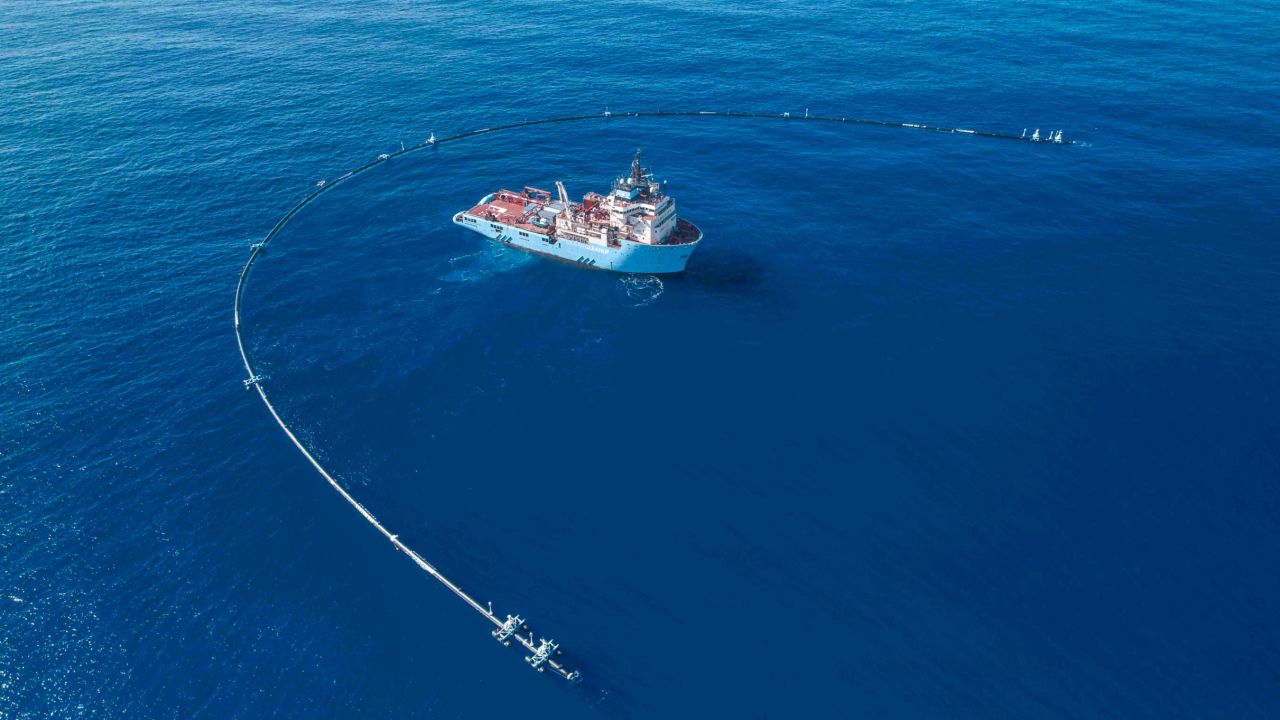 The Ocean Cleanup uses a U-shaped pipe to collect plastic. The company's goal is to clean the world's oceans. 