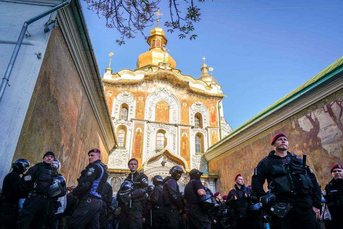Policemen stand guard in front of the central entrance of the Kiev Pechersk Lavra monastery on October 11.