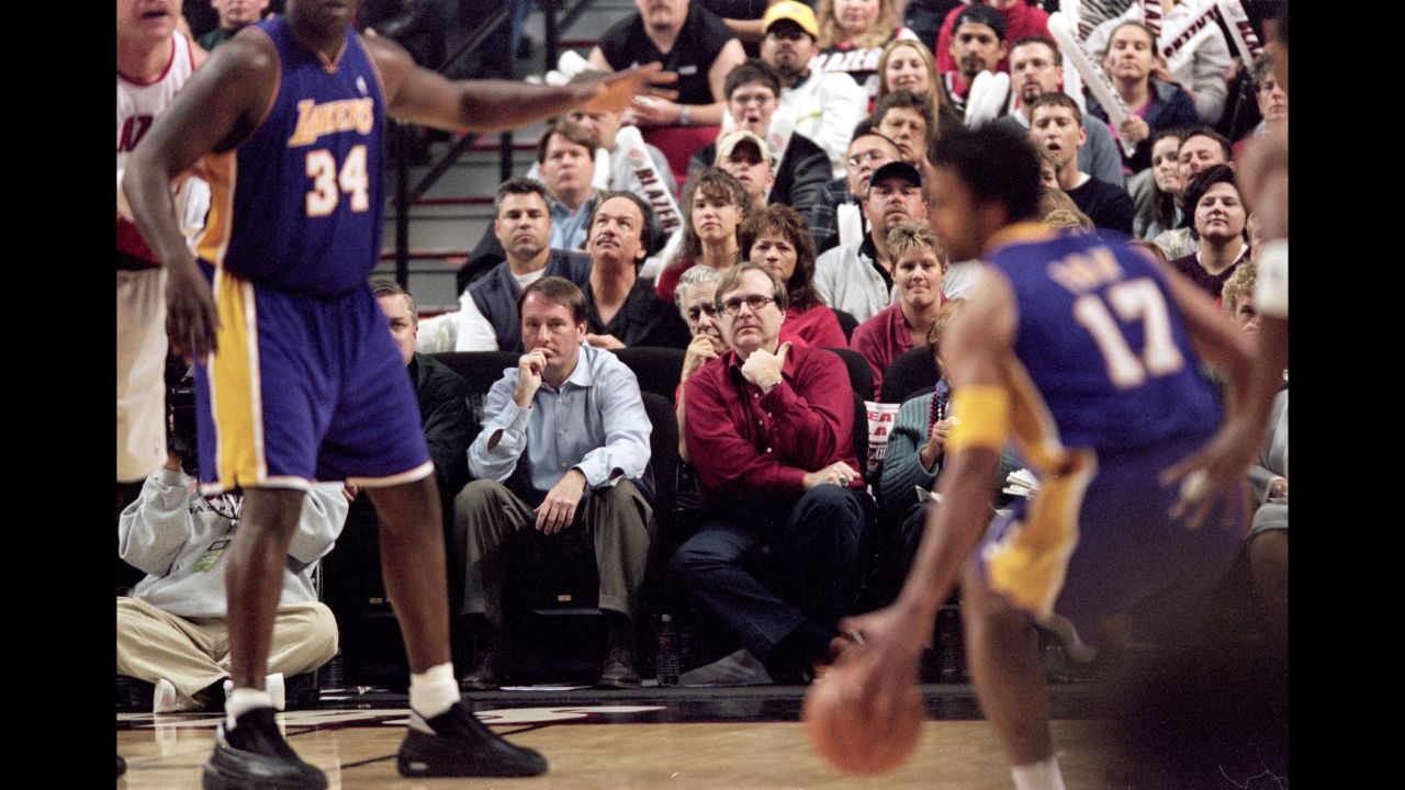Allen sits courtside with Portland Trail Blazers President Bob Whitsitt, left, during the Round One Playoff Game 3 against the Los Angeles Lakers at the Rose Garden in Portland, Oregon in 2001. Allen bought two professional sports teams -- the NBA's Trail Blazers and the NFL's Seattle Seahawks -- and was involved with both until his death.