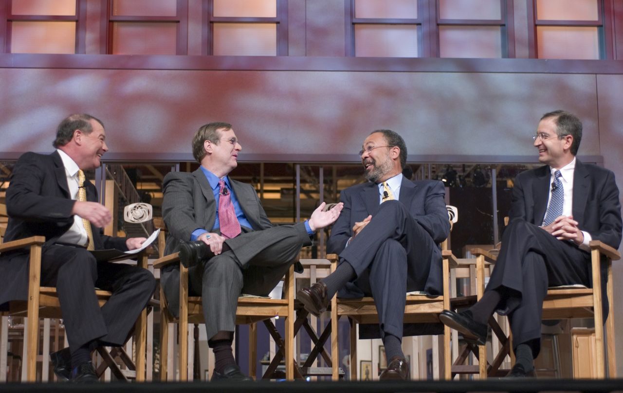 Stuart Varney of Fox News, left, moderates a panel featuring Paul Allen, Time Warner CEO Richard Parsons, and Comcast CEO Brian Roberts in New Orleans, Louisiana on May 3, 2004.