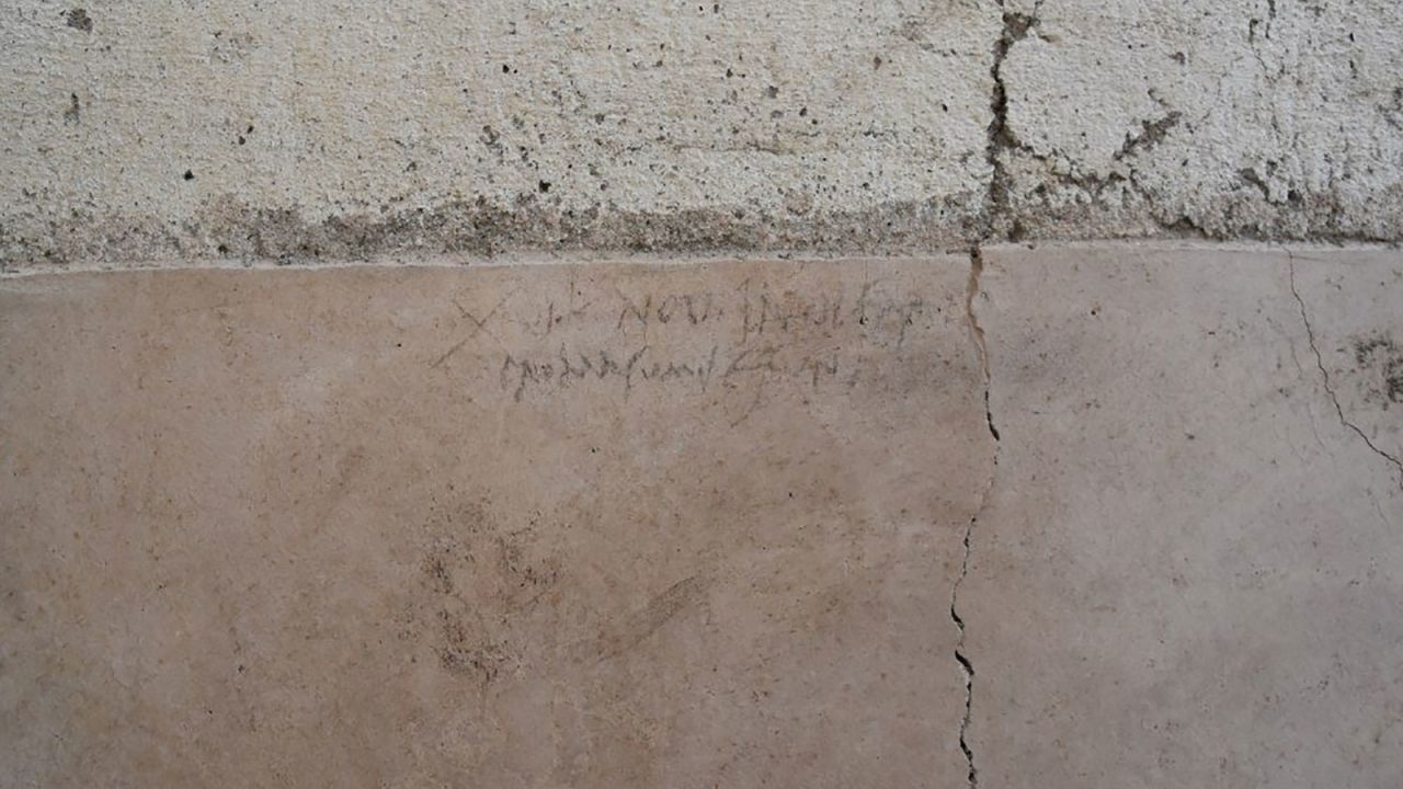 A charcoal inscription changes the date of the eruption that's been passed down through history