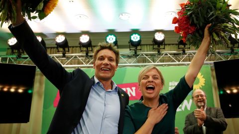 Katharina Schulze and Ludwig Hartmann, co-leaders of the Green Party in Bavaria, celebrate the results Sunday evening. 
