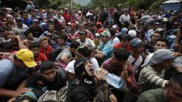 Hundreds of Hondurans are blocked at the border crossing in Agua Caliente, Guatemala, Monday, Oct. 15, 2018. A caravan of Honduran migrant moved towards the country's border with Guatemala in a desperate attempt to flee poverty and seek new lives in the United States. (AP Photo/Moises Castillo)