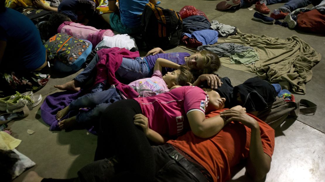 Honduran migrants sleep at an improvised shelter in Esquipulas, Guatemala, on Monday.