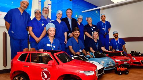 Five electric cars -- plus one remote-control car -- were donated to a British hospital to make the journey from the ward to surgery more enjoyable for children.