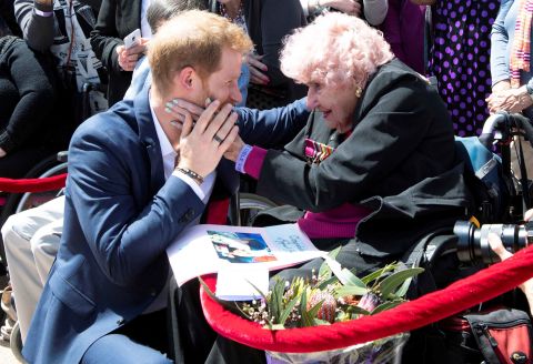 Harry is greeted by 98-year-old Sydney resident Daphne Dunne at the Sydney Opera House. Dunne had met Harry during his previous visits; the two shared a hug, and Harry introduced her to Meghan.