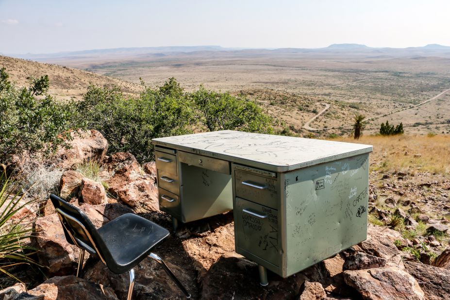 In the '80s, three Sul Ross State University students wanted to study in the fresh air, so they dragged a large, bulky desk up a hill behind the school, leaving a notebook inside. 