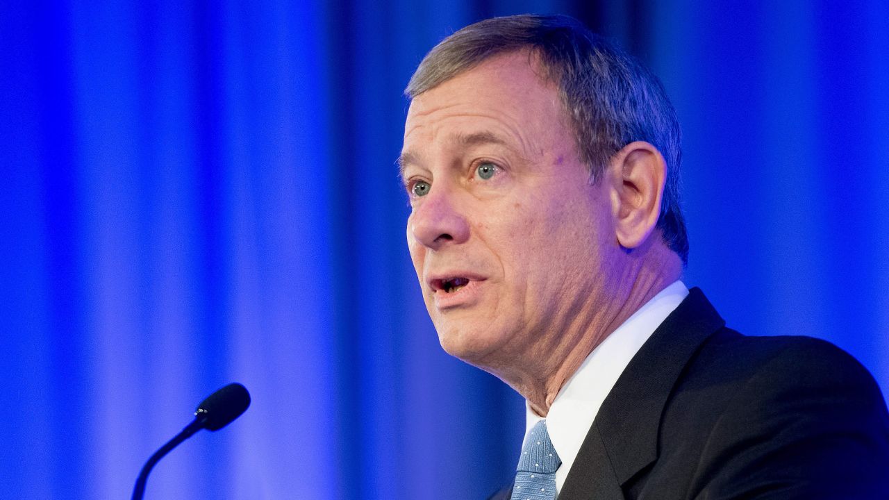 US Supreme Court Chief Justice John Roberts speaks before presenting US Supreme Court Justice Ruth Bader Ginsburg the American Law Institute's Henry J. Friendly Medal in Washington, DC, on May 14, 2018.