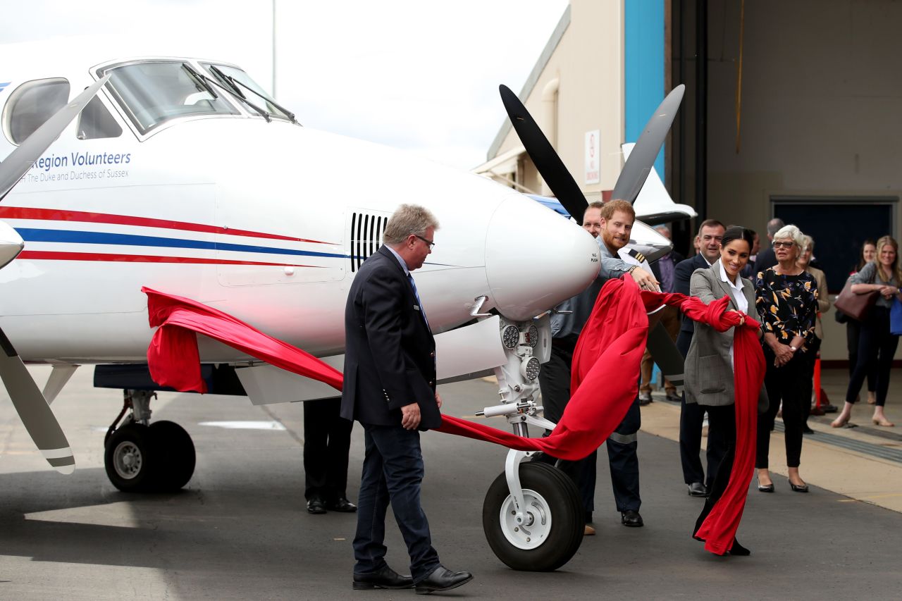 Harry and Meghan unveil a new aircraft in the Royal Flying Doctor Service during their visit to Dubbo.