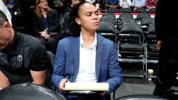 WASHINGTON, D.C. - OCTOBER 5: Kristi Toliver sits on the bench as an assistant coach of Washington Wizards during a pre-season game against the Miami Heat on October 5, 2018 at Capital One Arena, in Washington, D.C.  NOTE TO USER: User expressly acknowledges and agrees that, by downloading and/or using this Photograph, user is consenting to the terms and conditions of the Getty Images License Agreement. Mandatory Copyright Notice: Copyright 2018 NBAE (Photo by Ned Dishman/NBAE via Getty Images)