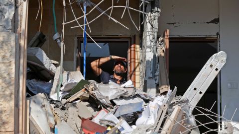 An Israeli sapper checks a house in the Israeli city of Beer Sheva after it was hit by a rocket fired from Gaza.