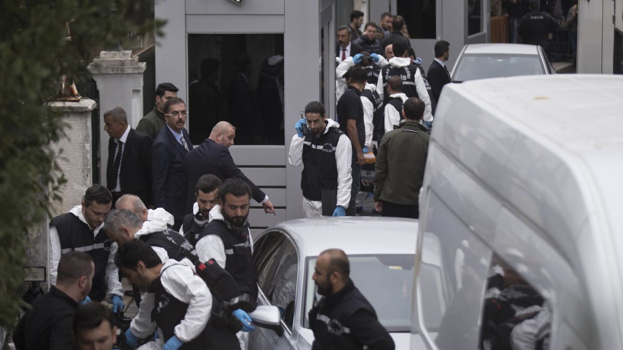 Turkish police officers gather outside the Saudi consul general's residence in Istanbul Wednesday.