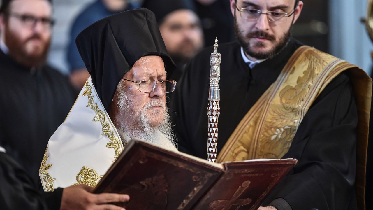 Ecumenical Patriarch Bartholomew I prays at the Hagia Triada Greek Orthodox church in Istanbul in September 2018.