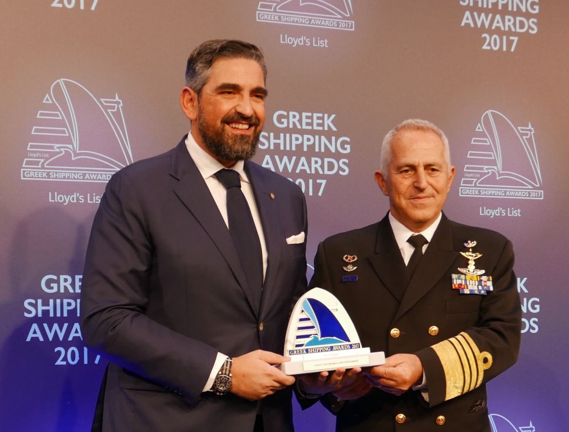 Panos Moraitis, left, receives a Greek shipping award in 2017.