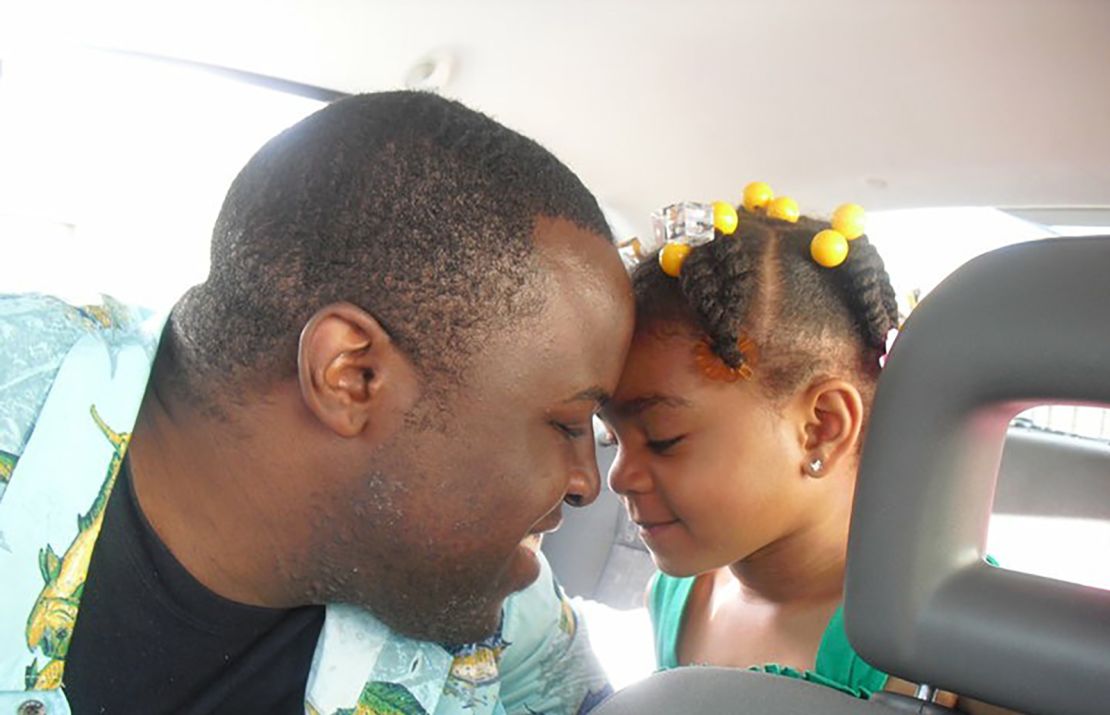 Chinedu Okobi pictured with his daughter.