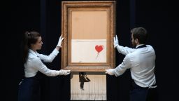 Sotheby's unveils Banksy's newly-titled 'Love is in the Bin' at Sotheby's on October 12, 2018 in London, England. Originally titled 'Girl with Balloon', the canvas passed through a hidden shredder seconds after the hammer fell at Sotheby's London Contemporary Art Evening Sale on October 5, making it the first artwork in history to have been created live during an auction.