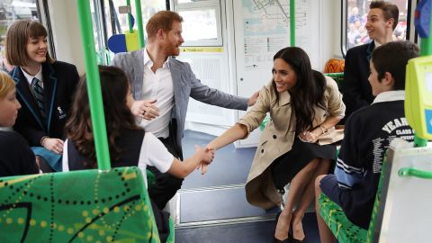 Prince Harry, Duke of Sussex and Meghan, Duchess of Sussex talk to students from Albert Park Primary School, Port Melbourne Primary School and Elwood Secondary College while riding on a Melbourne Tram on Thursday, October 18.