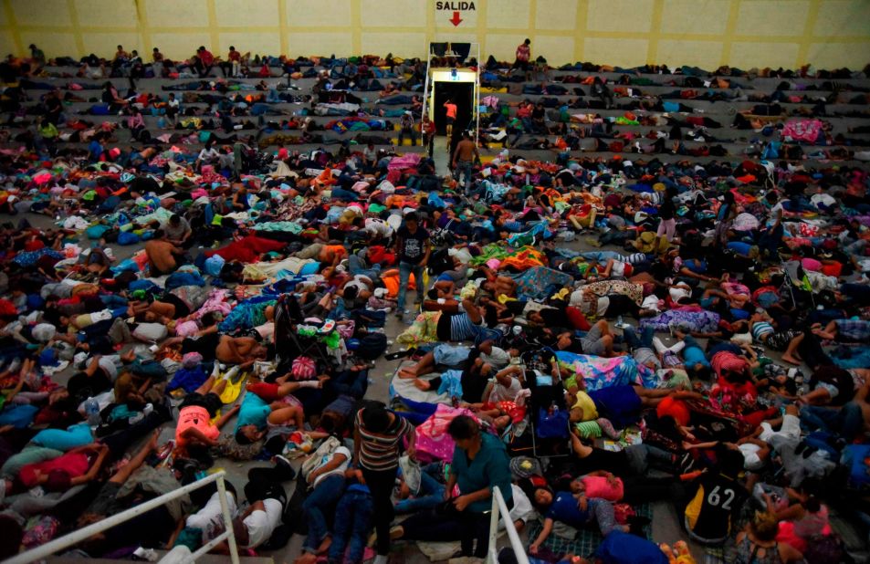 Honduran migrants heading to the United States rest at a gymnasium of a Catholic church in Chiquimula, Guatemala, on Tuesday, October 16, 2018. The caravan set out October 13 from the impoverished, violence-plagued country. 