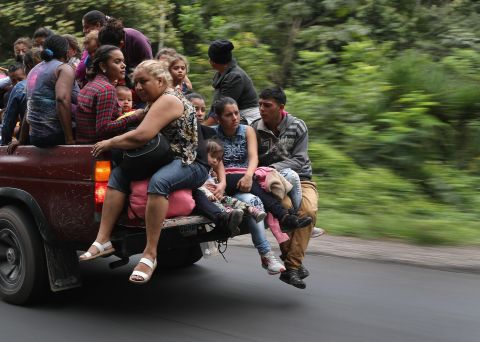 Honduran migrants move north on Tuesday near Quezaltepeque, Guatemala. 