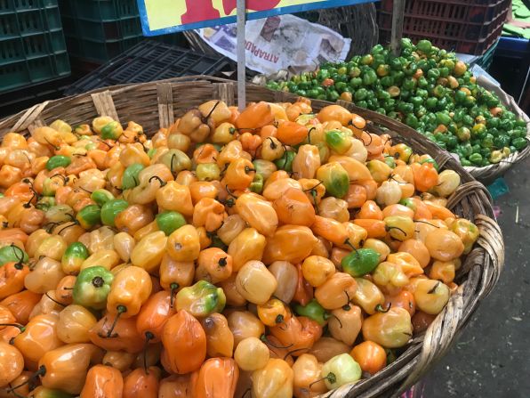 <strong>Peppers aplenty: </strong>A basketful of <em>habaneros </em>in the vegetable section of the market. 