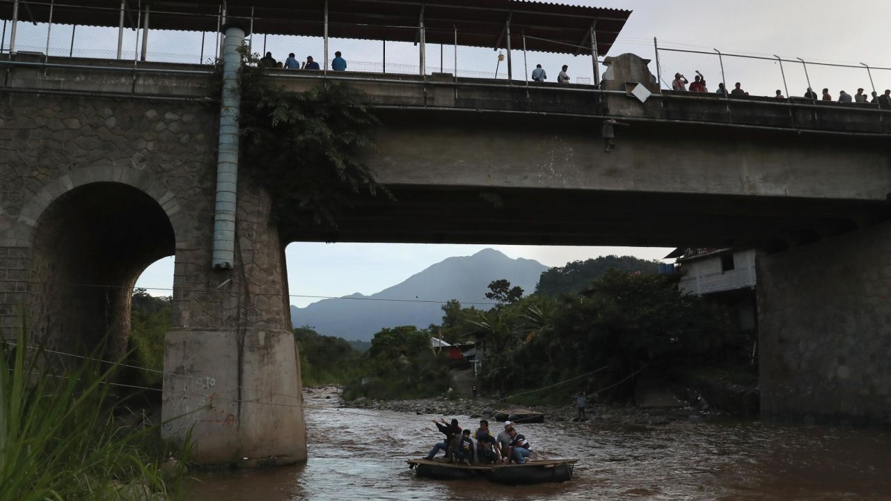 This file photo from August 9, 2018, shows an area where people cross the Suchiate River from Guatemala into Mexico. The illegal crossing point is located just under the international bridge connecting the two countries, circumventing immigration and customs checkpoints.
