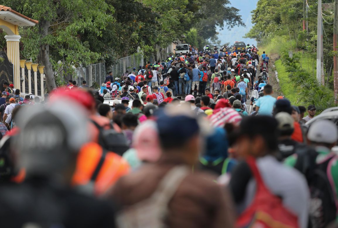 A caravan of more than 1,500 Honduran migrants moves north <a href="https://www.cnn.com/2018/10/18/americas/gallery/central-america-migrant-caravan/index.html" target="_blank">after crossing the border from Honduras into Guatemala</a> in Esquipulas, Guatemala, on Monday, October 15. The caravan, the second of 2018, began Friday in San Pedro Sula, Honduras, with plans to march to the United States.