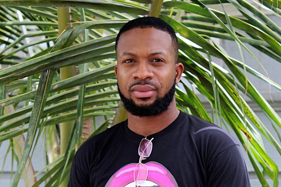 Adebayo Oke-Lawal outside his studio in Lekki, Lagos. Since launching Orange Culture in 2011, he's achieved international recognition with sales in Lagos, Paris, London, New York, LA, and Nairobi.