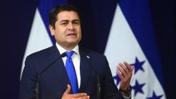 Honduran President Juan Orlando Hernandez speaks during a press conference at the presidential house in San Salvador, on February 10, 2015. Hernandez arrived in San Salvador to strengthen bilateral ties between both countries, and to promote a series of projects to convert the Gulf of Fonseca in an area with economic and social development. AFP PHOTO / Marvin RECINOS        (Photo credit should read Marvin RECINOS/AFP/Getty Images)