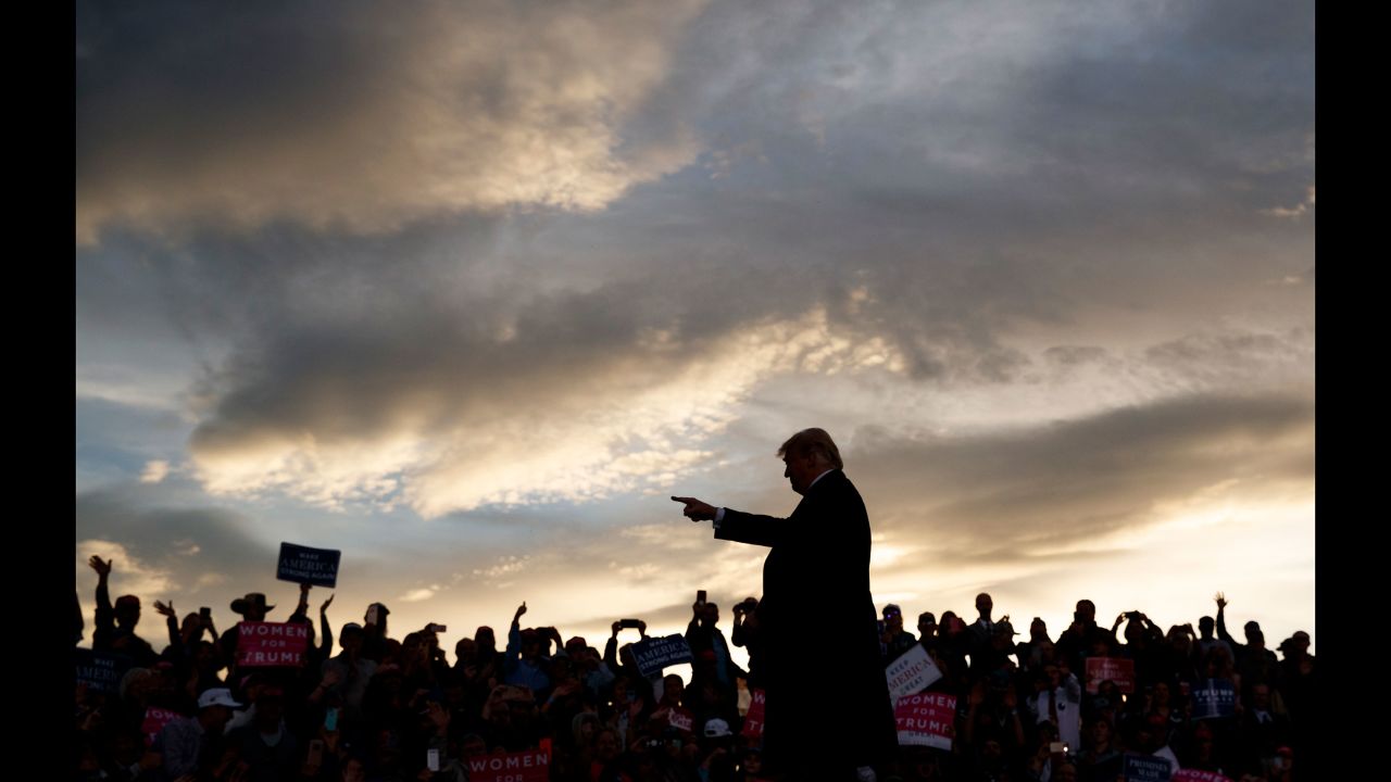 President Donald Trump arrives at a campaign rally in Missoula, Montana, as the sun sets on Thursday, October 18.