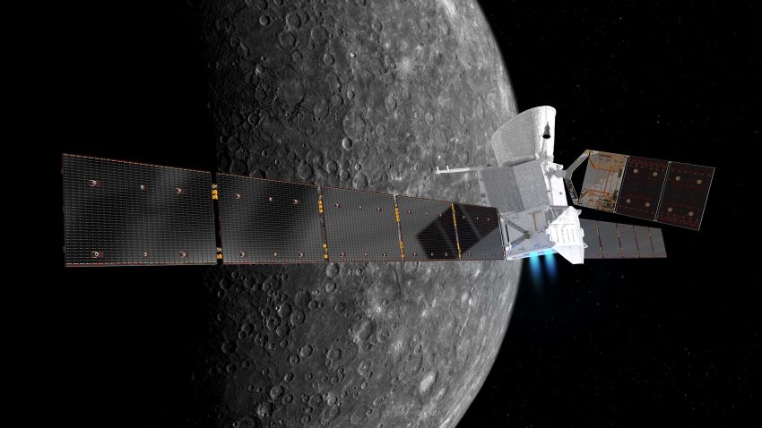 Artist's impression of the BepiColombo spacecraft in cruise configuration, with Mercury in the background. On its 7.2 year journey to the innermost planet, BepiColombo will fly by Earth once, Venus twice and Mercury six times before entering into orbit.
The Mercury Transfer Module is shown with ion thrusters firing, and with its solar wings extended, spanning about 30 m from tip-to-tip. The 7.5 m-long solar array of the Mercury Planetary Orbiter in the middle is seen extending to the top. The Mercury Magnetospheric Orbiter is hidden inside the sunshield in this orientation. 
BepiColombo is a joint endeavour between ESA and the Japan Aerospace Exploration Agency, JAXA. 
The view of Mercury is based on imagery from NASA's Mariner 10 mission.
