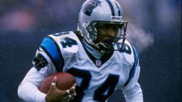 9 Nov 1997:  Wide receiver Rae Carruth of the Carolina Panthers moves the ball during a game against the Denver Broncos at Mile High Stadium in Denver, Colorado.  The Broncos won the game, 34-0. 