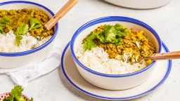 Lentil curry with rice, Indian cuisine, tarka dal, white background. Vegan food. Clean eating concept.; Shutterstock ID 1159668289; Job: -